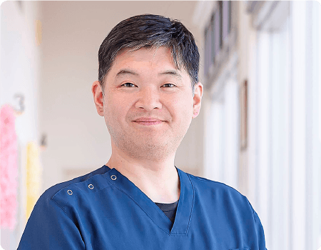 歯科医師 納冨 彰人